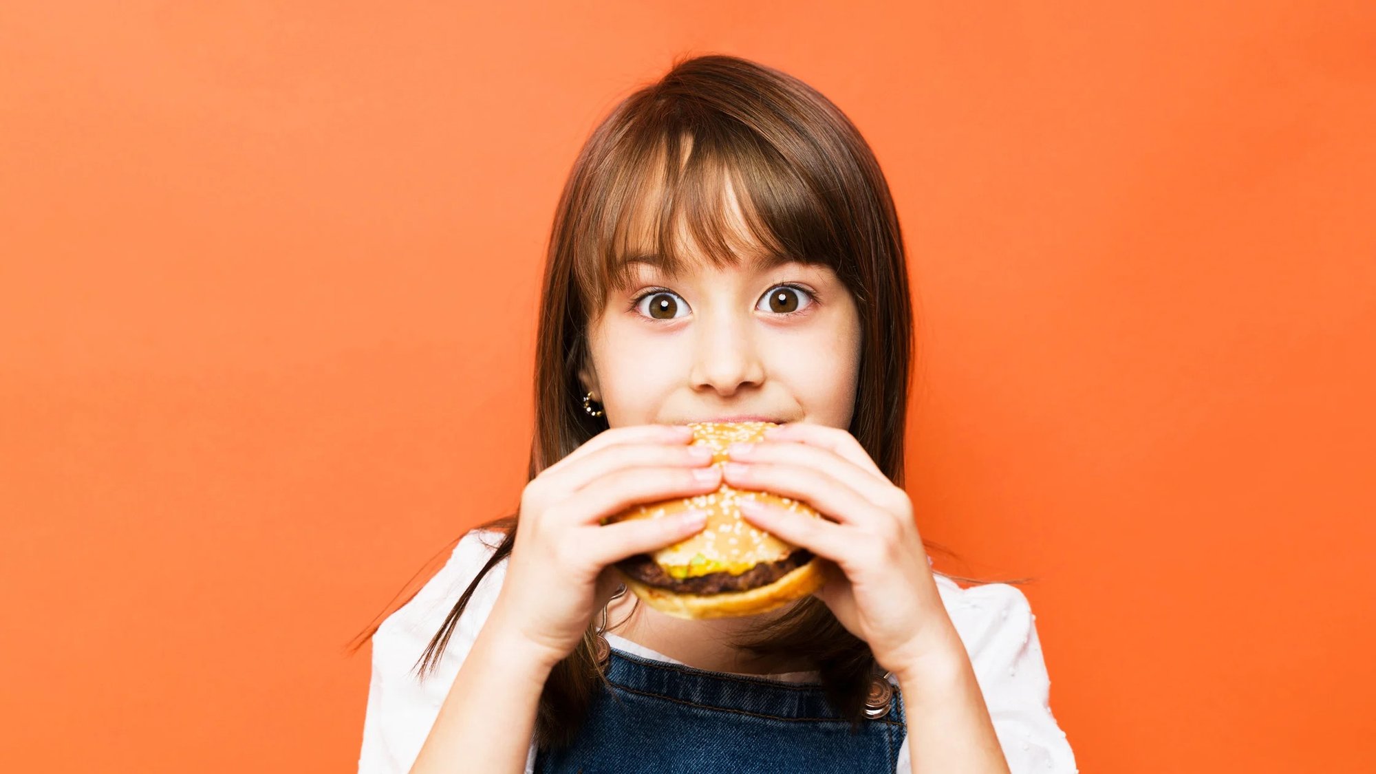 Image of a young girl eating