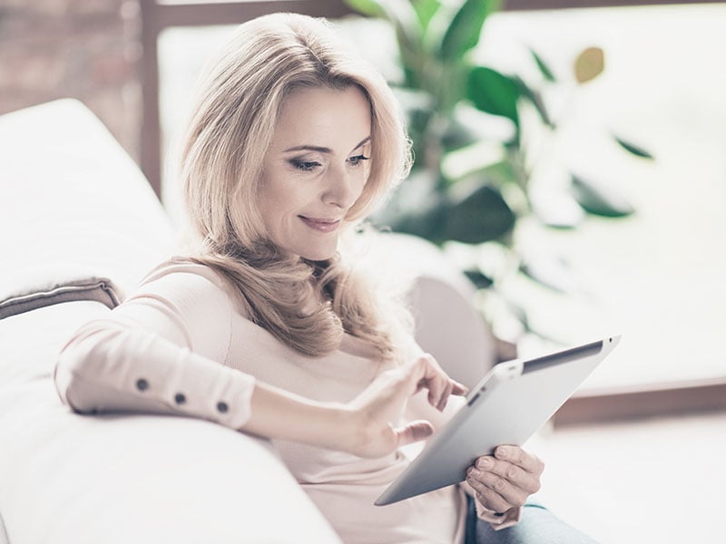 Woman receives Push Notifications via the Sentral for Parents App